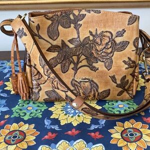 Floral-Embossed Tan Leather Crossbody with Tassel Accent